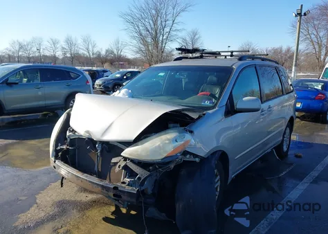 2007 Toyota Sienna Xle z USA, uszkodzony, nr VIN 5TDBK22C77S007279